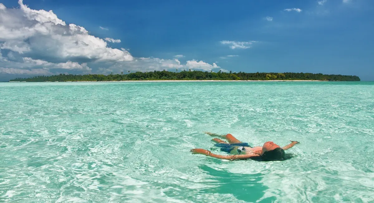Travelers relaxing during a 3D2N island expedition in Palawan