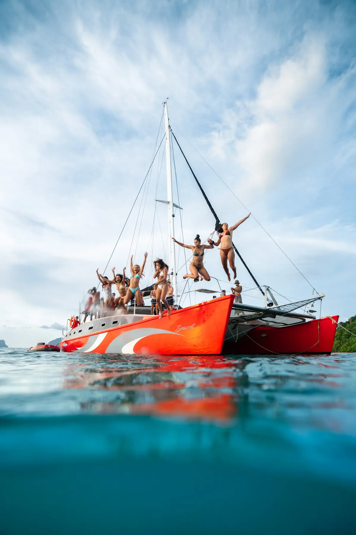 Luxury yacht cruising through Bacuit Bay in El Nido